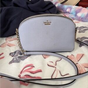 Kate Spade Blue Crossbody Bag with Curved Shape and Textured Leather
